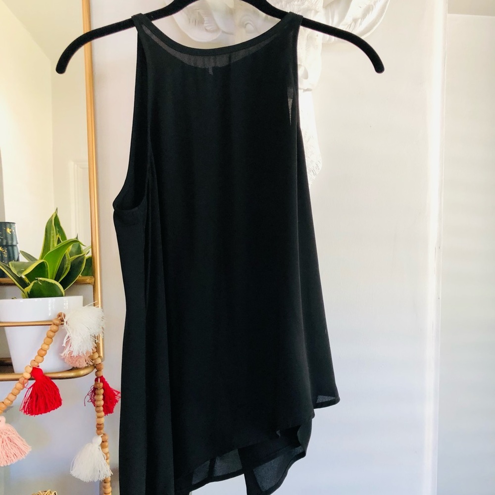 Express A symmetrical sleeveless blouse